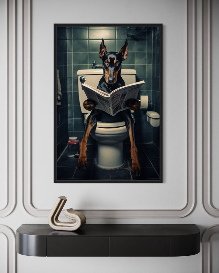 Black Dobermann Dog On The Toilet Reading Newspaper Picture