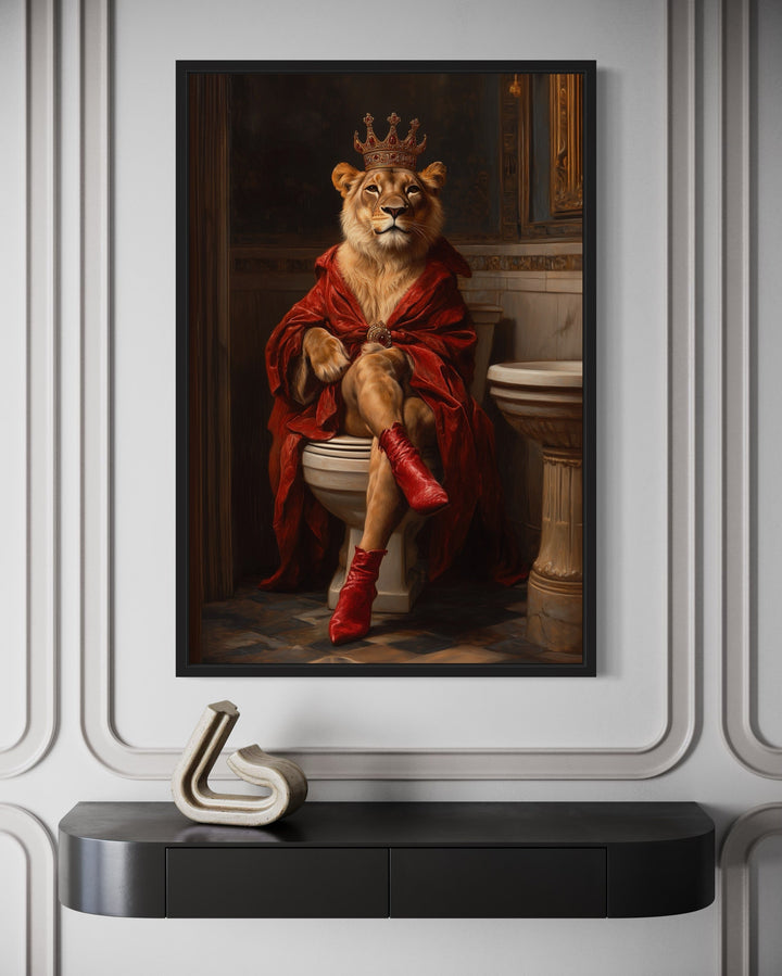 Royal Lioness With Crown Sitting on Toilet Framed Canvas Picture