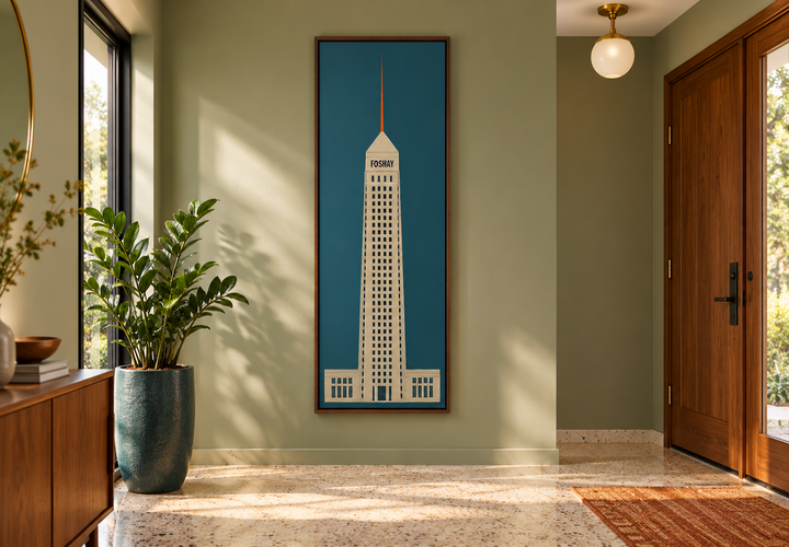 Tall vertical minimalist Foshay Tower architectural wall art in a walnut frame on a sage green wall.