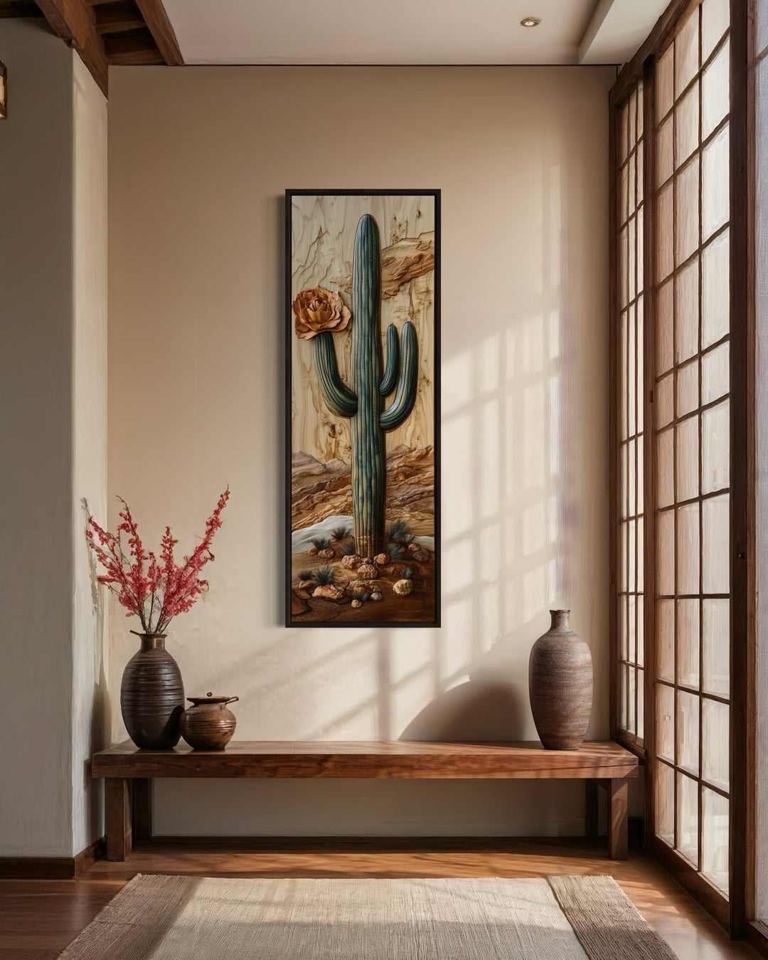 a painting of a cactus hangs on a wall