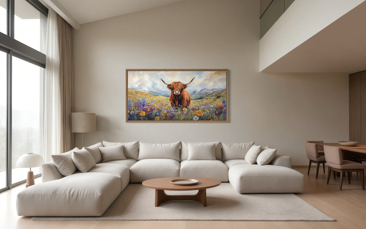 Highland Cow In Wildflower Field Framed Canvas Wall Art in a living room filled with furniture