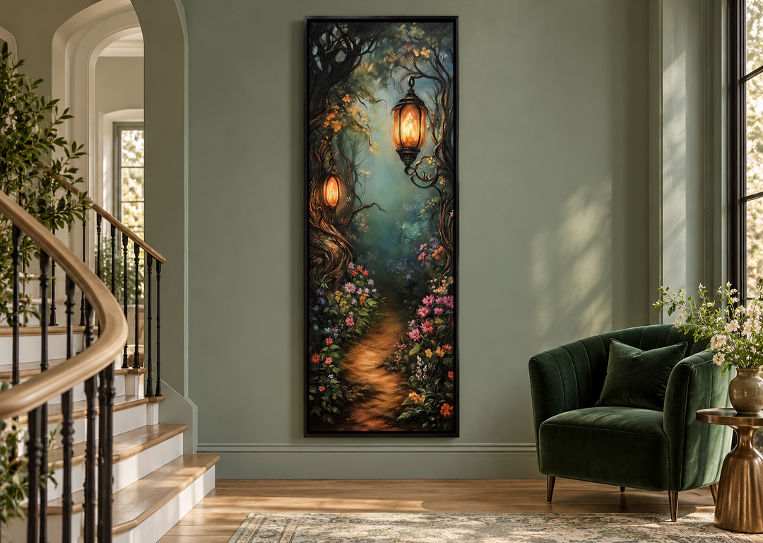 Tall narrow wall art of an enchanted forest pathway with glowing lanterns in a black frame.