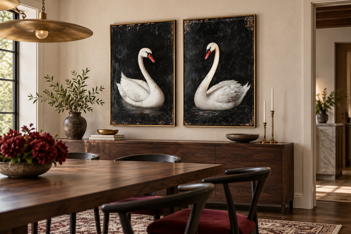 Set of 2 framed canvas wall art featuring antique white swans on a textured black background.