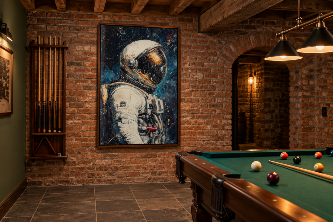 Astronaut Graffiti Framed Canvas Wall Art in a walnut frame on a rustic brick wall in a pool room.