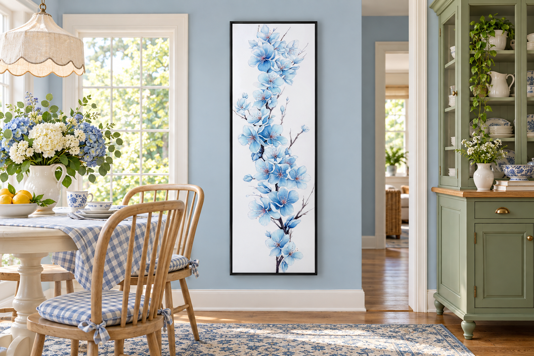 Blue Watercolor Floral Sakura Blossom Vertical Narrow Canvas Wall Art in a black frame on a blue wall