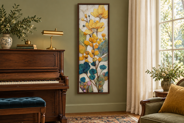 Tall narrow vertical canvas wall art with yellow and blue floral botanical design in a wood frame.