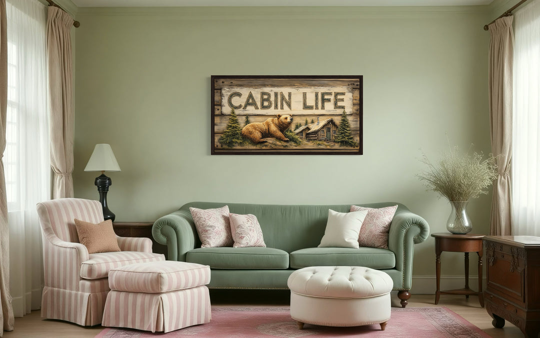 Cabin Life Sign With Log House And Bear Framed Canvas Wall Art in a living room filled with furniture