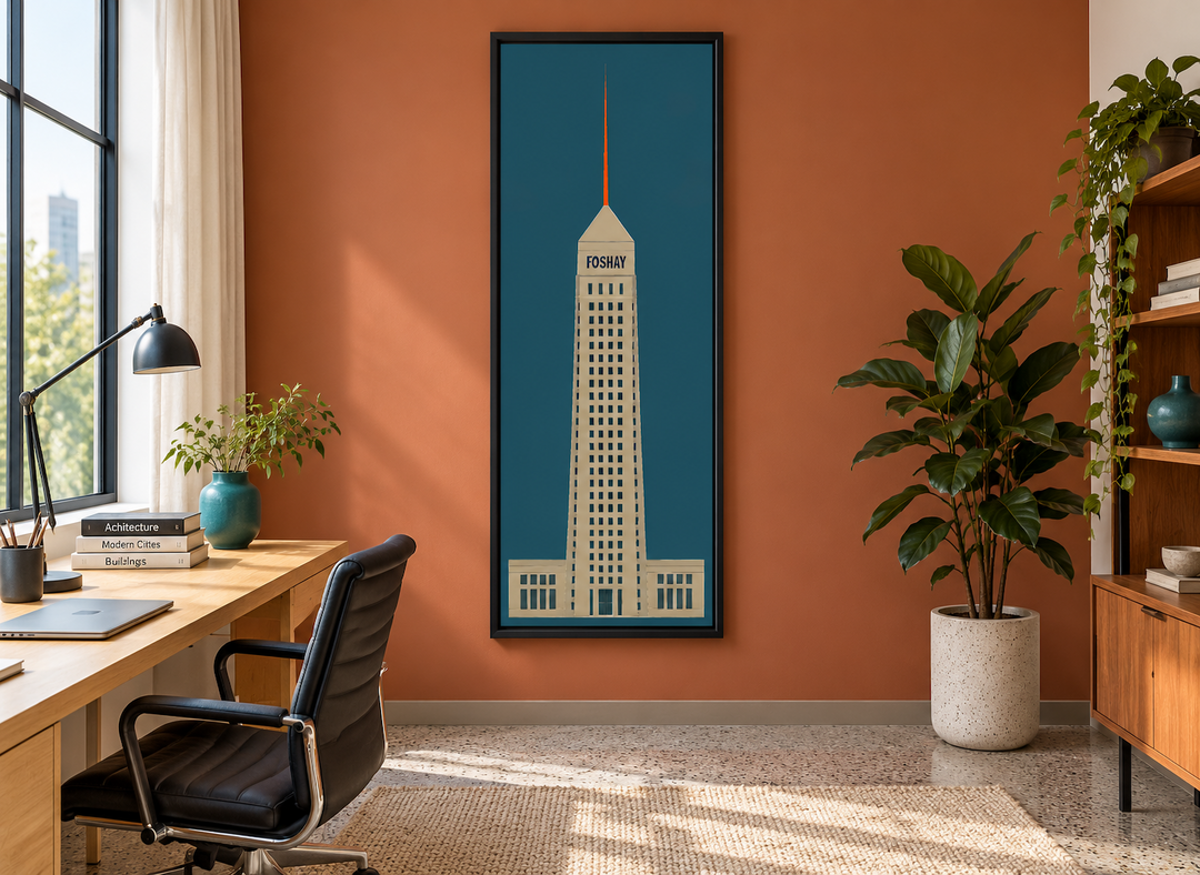 Tall vertical minimalist Foshay Tower architectural wall art in a black frame on a terracotta wall.