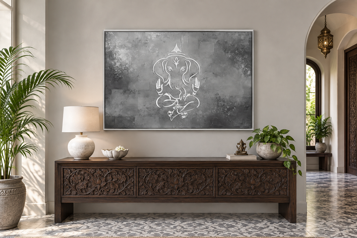 Minimalist Lord Ganesh framed canvas wall art in grey, silver, and white above a wooden console.