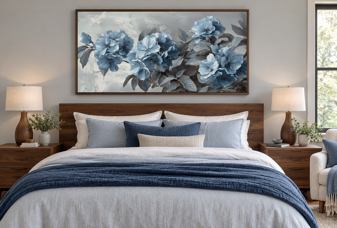 Large abstract light blue floral canvas art hanging above a bed in a modern bedroom.