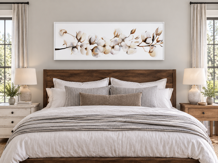 Boho long horizontal neutral cotton plant painting canvas wall art above a wooden bed frame.