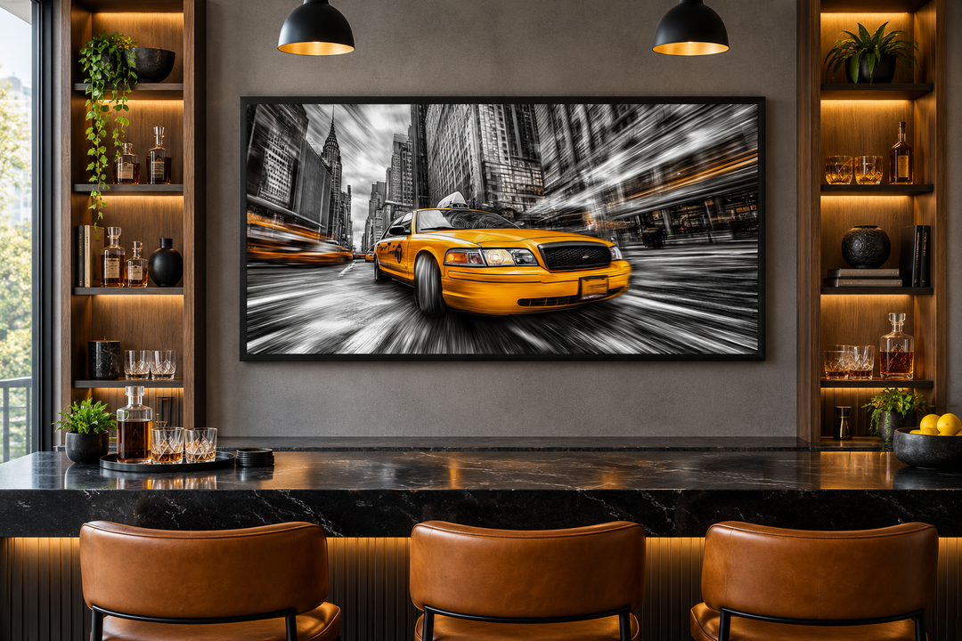 New York City yellow taxi graffiti style canvas wall art in a black frame above a modern home bar.