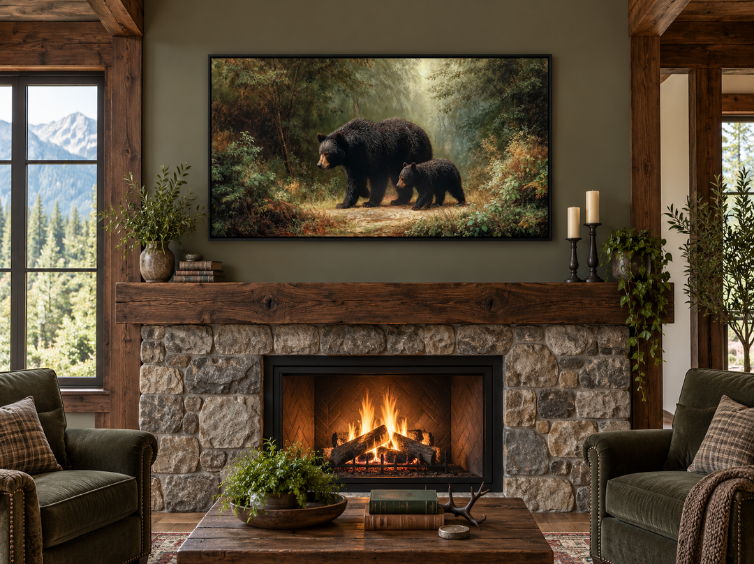 Black mama bear and cub canvas wall art displayed above a rustic stone fireplace in a cozy cabin.