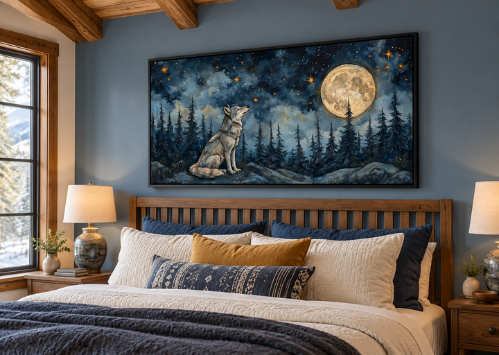 Wolf wall art canvas featuring a wolf under a full moon in a night forest above a bed in a cabin.
