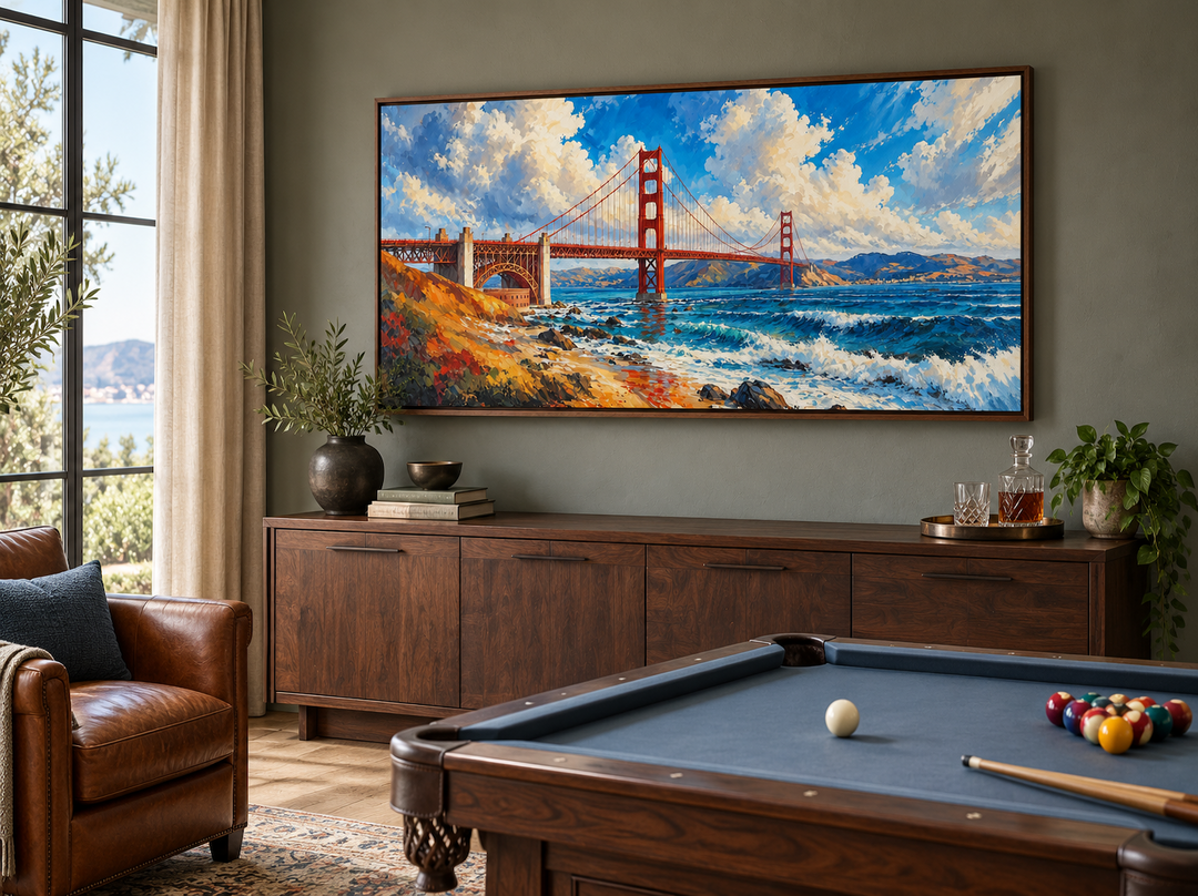 Framed oil painting of the Golden Gate Bridge in a modern room with a pool table and walnut cabinet.