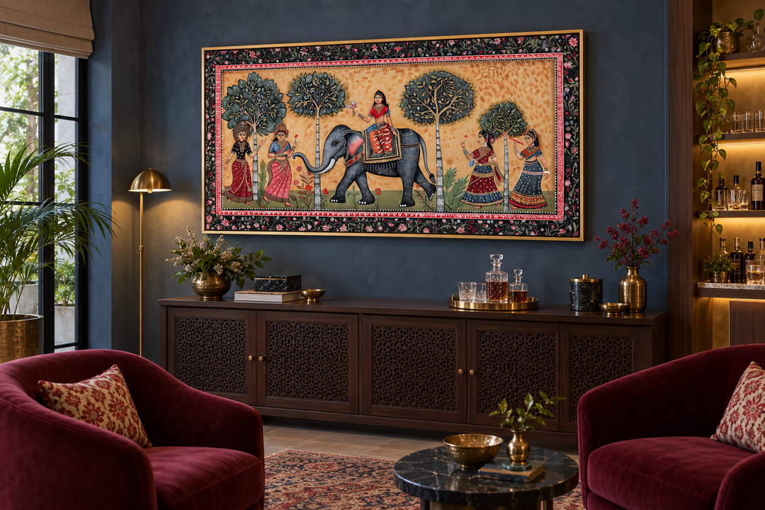 Framed Madhubani style canvas wall art featuring a majestic Indian elephant and women with flowers.