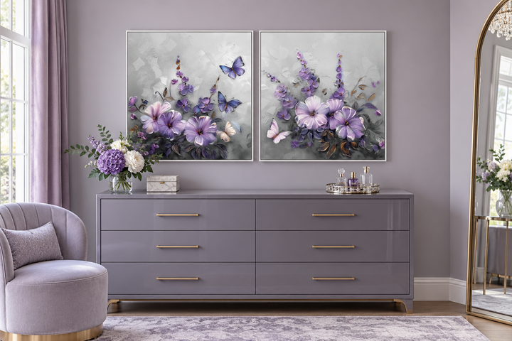 Set of 2 light purple floral prints with lavender blossoms and butterflies in white frames.