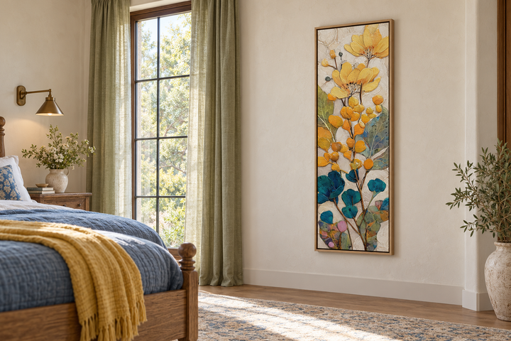 Tall narrow vertical canvas wall art featuring yellow and blue botanical flowers in a wood frame.