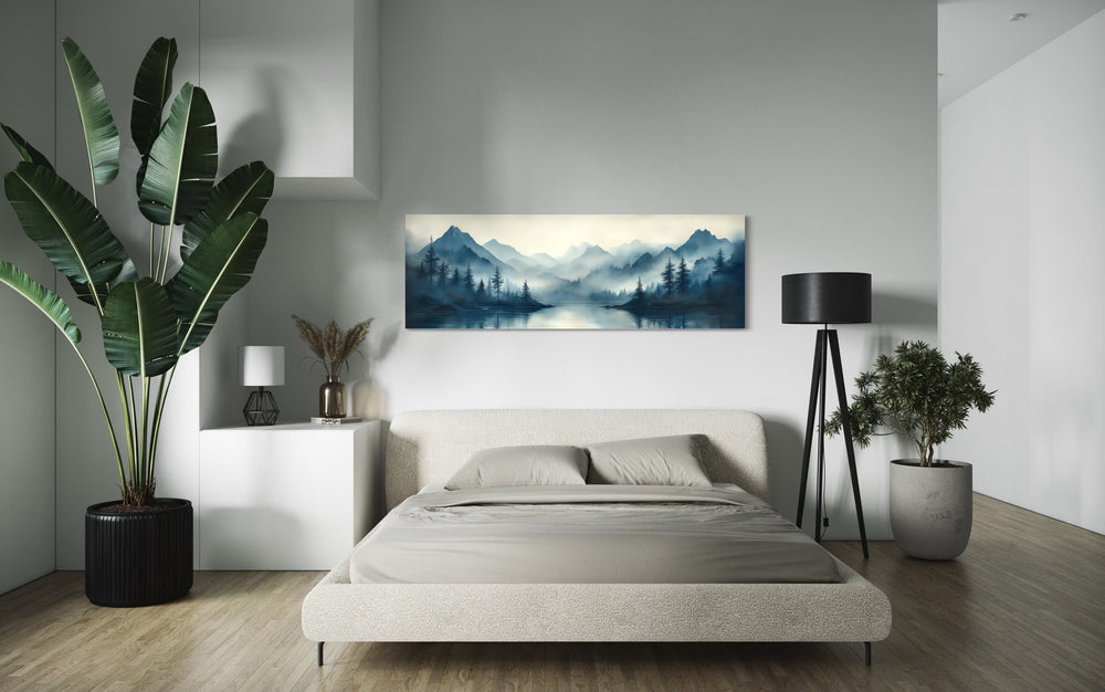 Navy Blue Mountain Lake Landscape Long Horizontal Above Bed Framed Canvas Wall Art in a bedroom with a bed