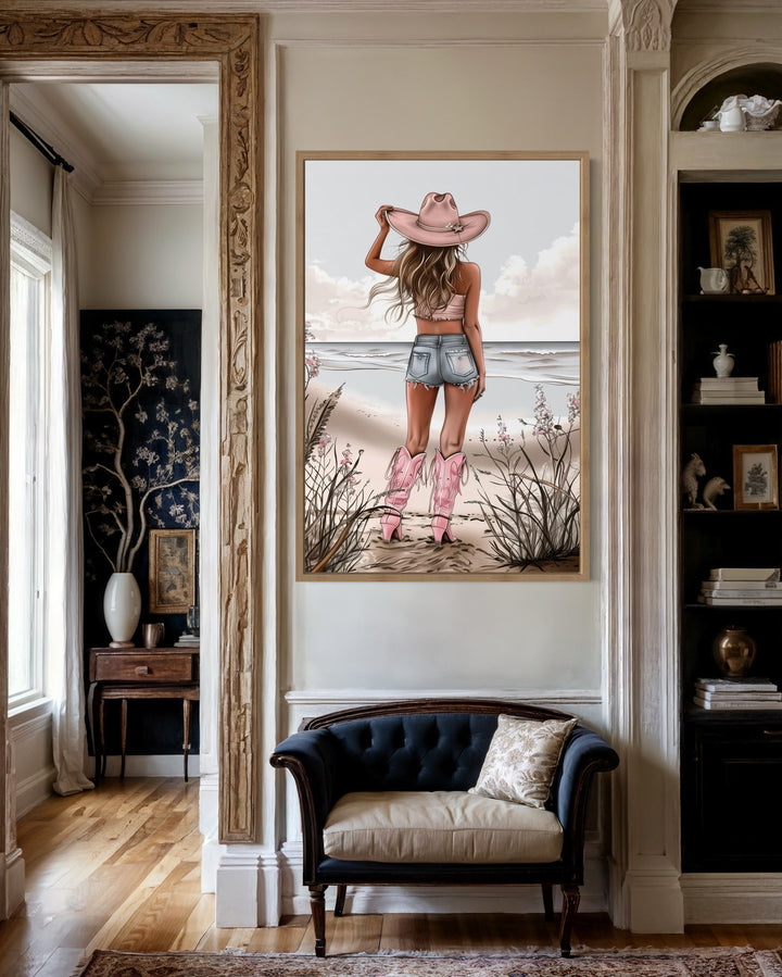 Coastal Cowgirl In Pink Boots And Hat On The Beach Framed Canvas Wall Art in living room