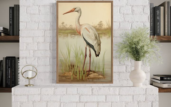 Vintage Stork Painting Coastal Framed Canvas Wall Art on brick wall