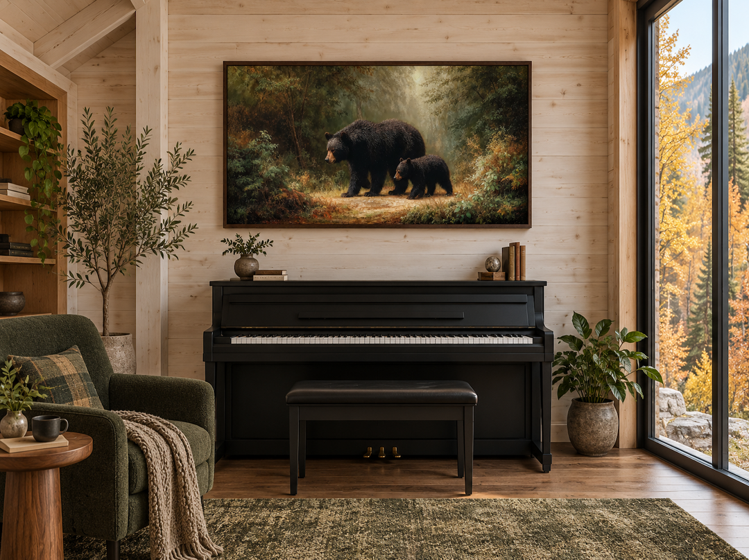 Black mama bear and cub walking through a sunlit forest on a horizontal canvas wall art.