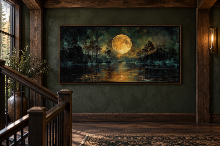 Gothic wall art of a full yellow moon over a dark lake, framed in a rustic wooden interior.