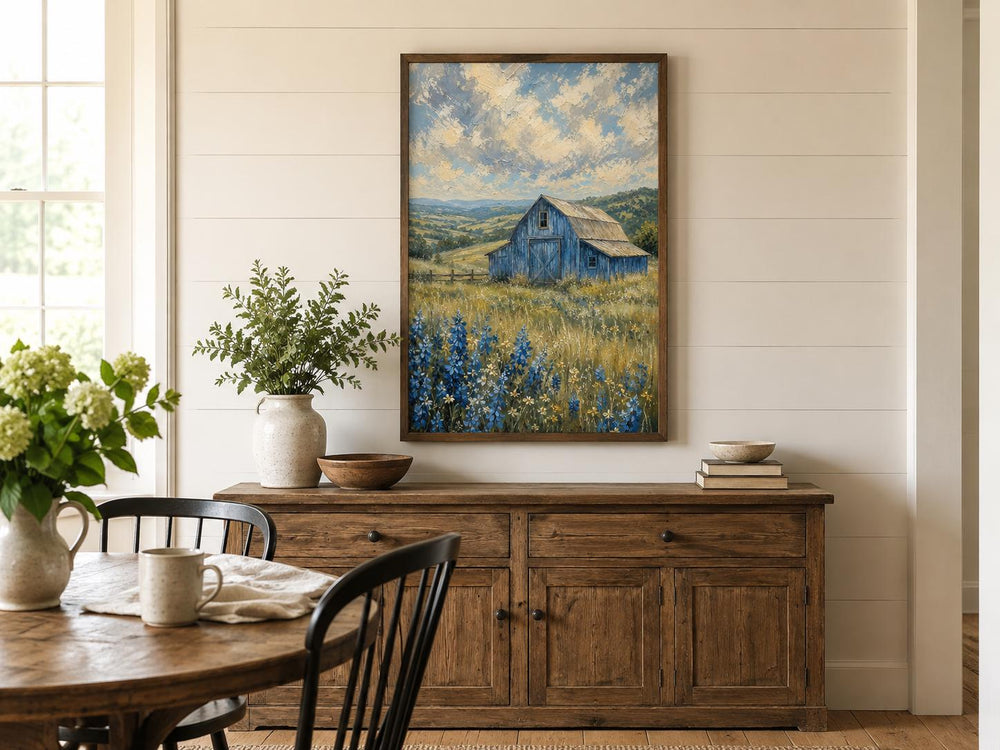 Vertical farmhouse canvas art of a blue barn in a field of bluebonnets under a cloudy sky.