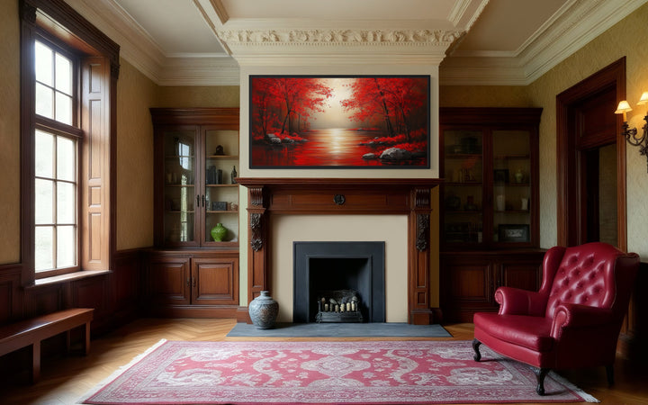 Red Trees And River Autumn Landscape Framed Canvas Wall Art in a living room with a fire place