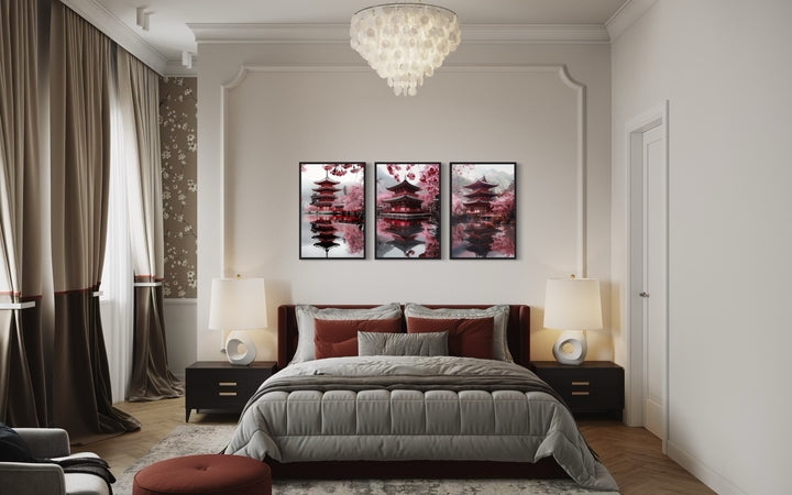 Set Of Three Japanese Pagoda and Cherry Blossom Wall Art a bedroom with a bed, two lamps and a chandelier