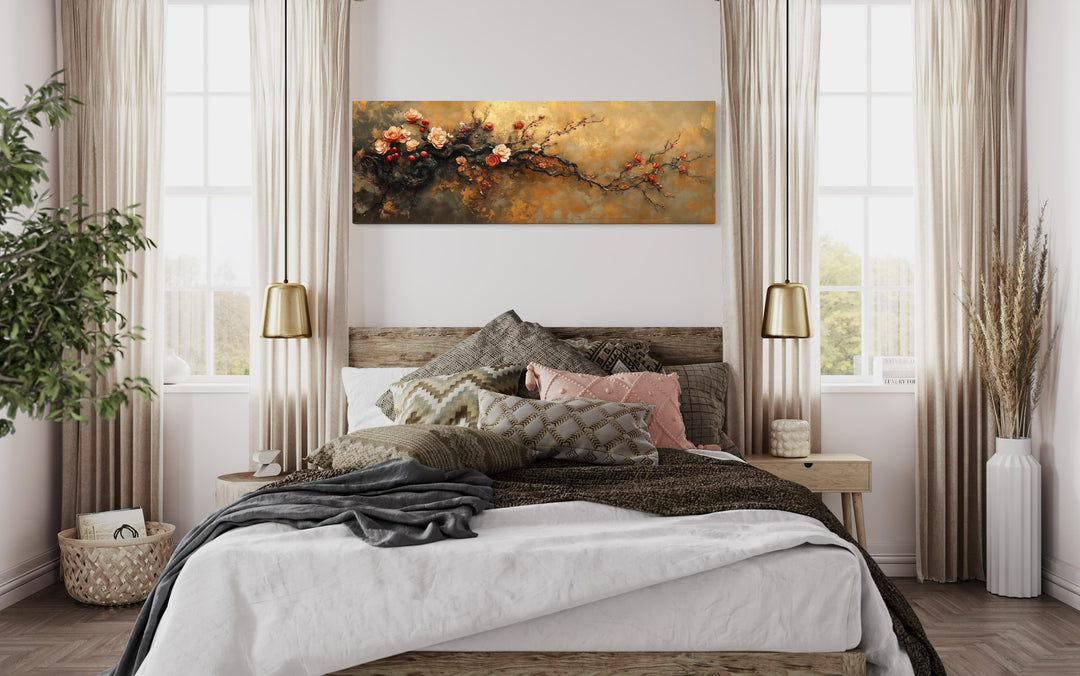 Pink Tree Blossoms On Gold Background Long Horizontal Wall Art in a bedroom with a bed