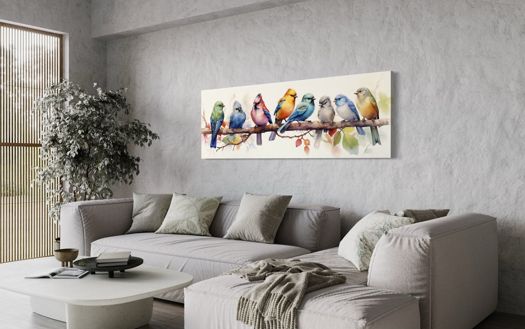 Colorful Birds On A Branch Horizontal Framed Canvas Wall Art above grey couch