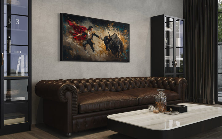 Spanish Matador Fighting Bull Canvas Wall Art in a living room with a leather couch