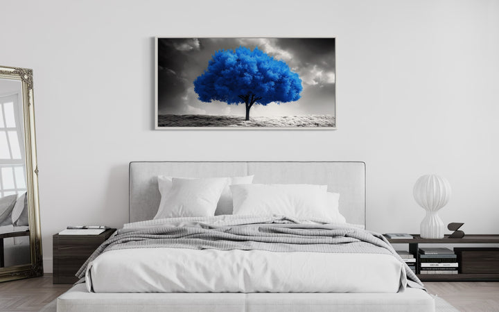 Blue Tree on Black White Background Framed Canvas Wall Art in a bedroom