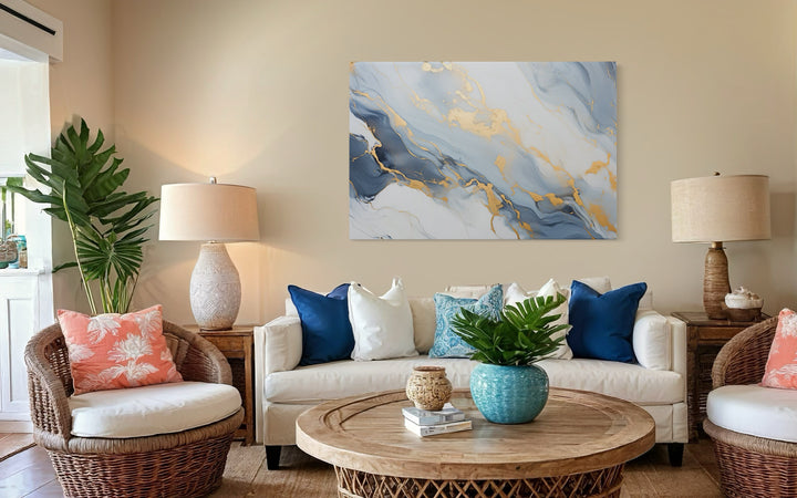 Pale Blue Grey Gold Abstract Marble Canvas Wall Art in a living room filled with furniture