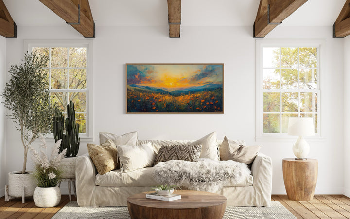 Beautiful Wildflower Field At Sunset Painting Framed Canvas Wall Art in a living room filled with furniture