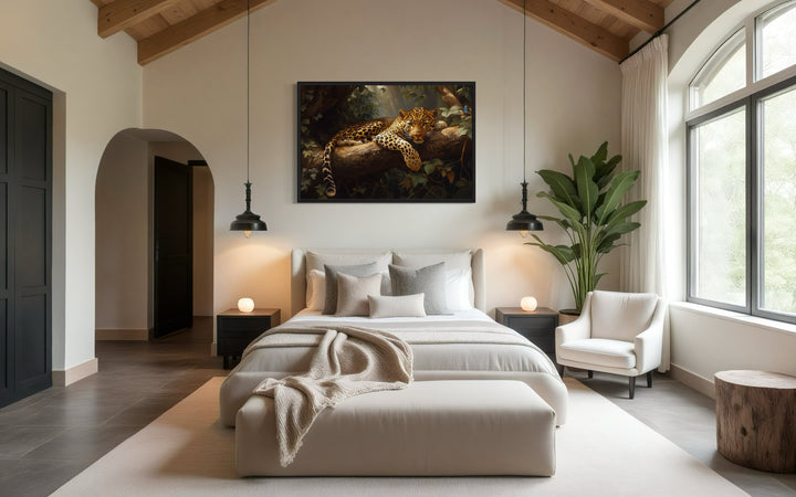 a bedroom with a large bed and a painting on the wall