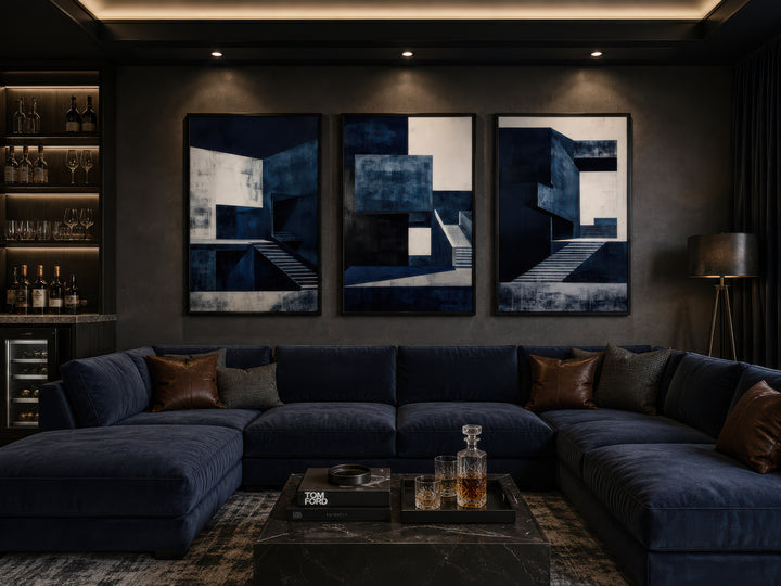 3 piece mid century modern navy blue architectural wall art set displayed above a navy blue sofa.