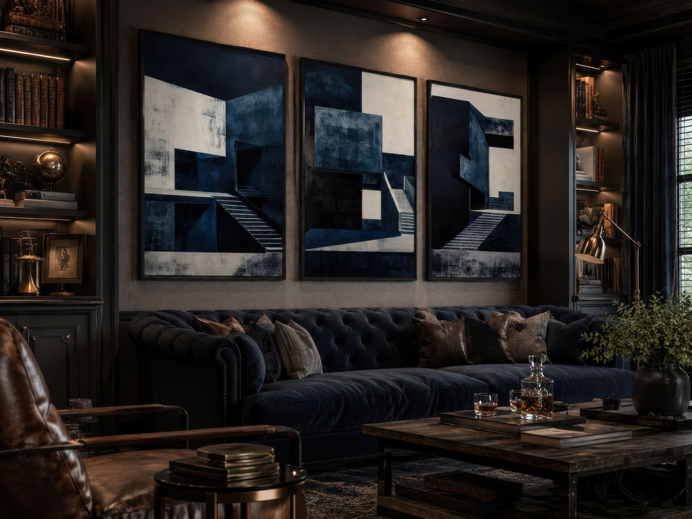 3 piece mid century modern navy blue architectural wall art set displayed above a navy blue sofa.