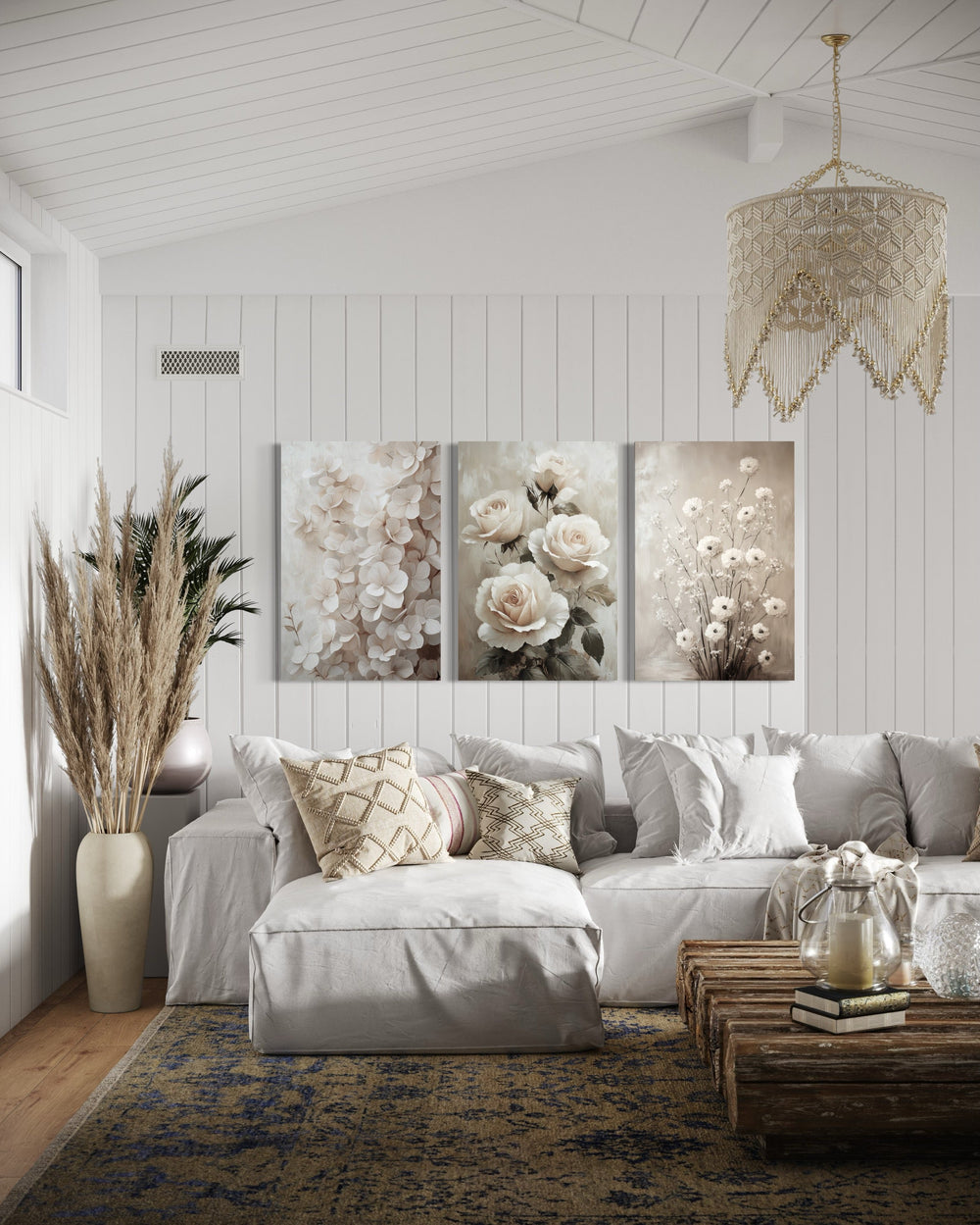 3 Piece Neutral Boho Floral Farmhouse Framed Canvas Wall Art in a living room filled with furniture and a chandelier