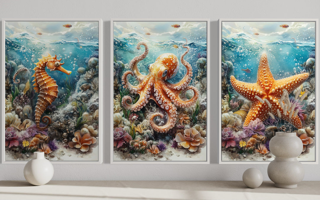 3 piece framed canvas wall art set featuring an orange seahorse, octopus, and starfish underwater.