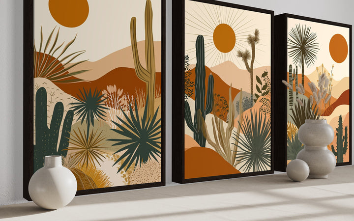 3-piece mid-century modern framed canvas art set featuring desert cacti, hills, and an orange sun.