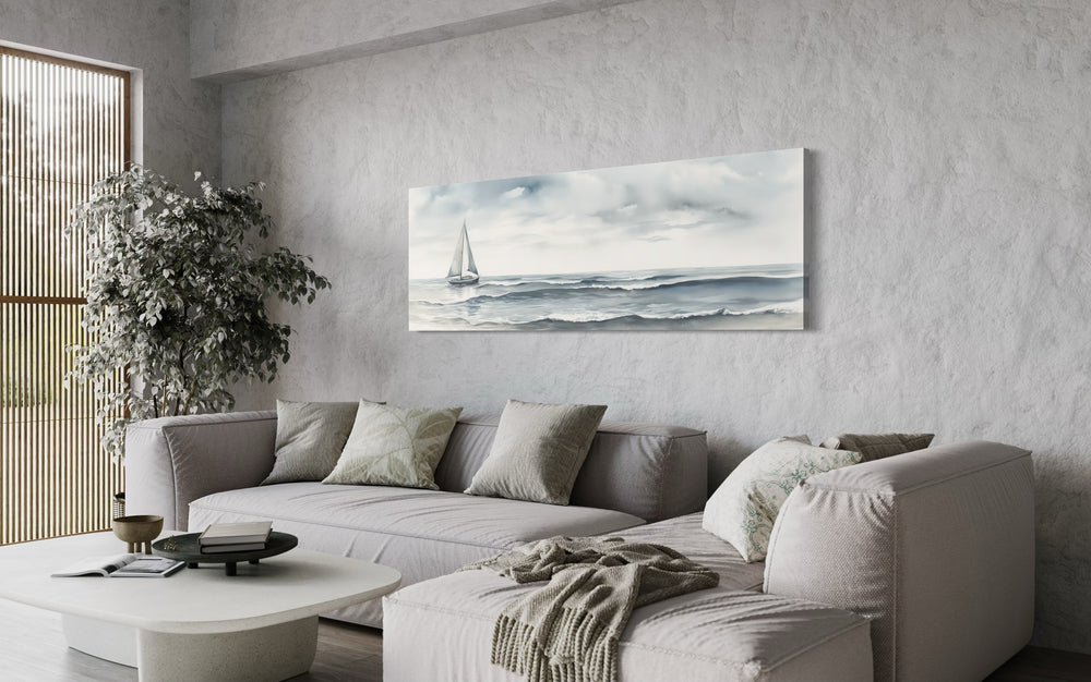 Grey Ocean And Sail Boat Coastal Horizontal Canvas Wall Art above grey couch