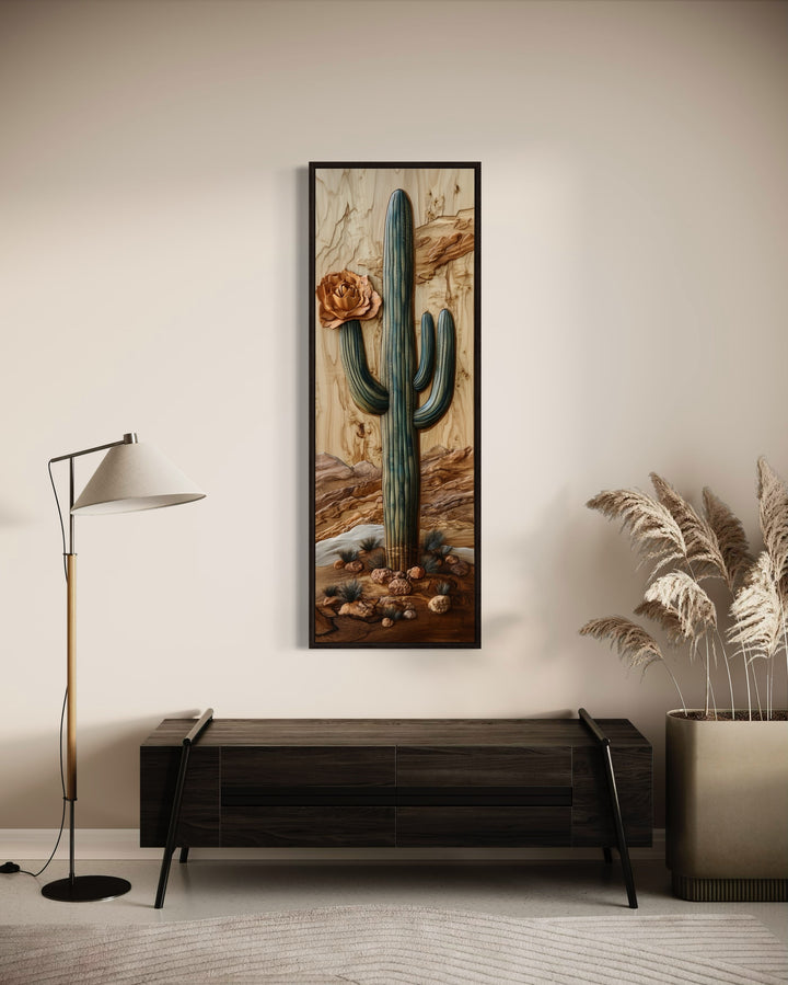 a painting of a cactus hangs on a wall