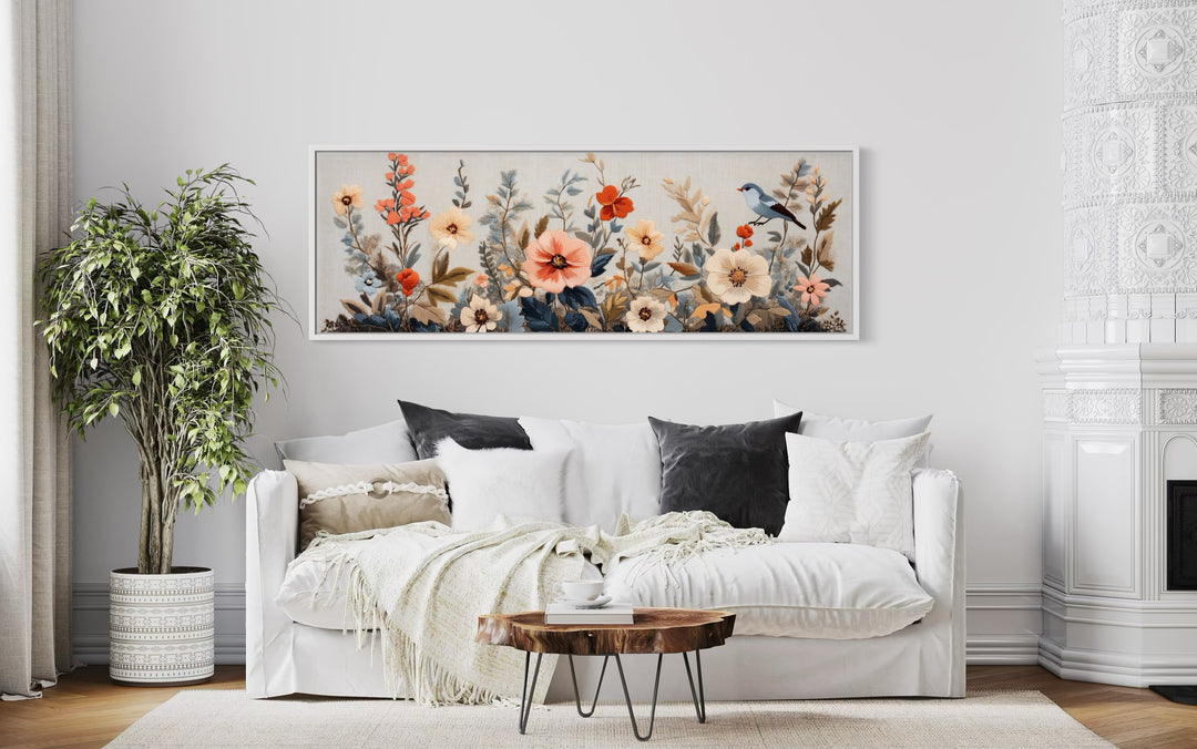 Floral Bouquet with Bird Panoramic Framed Tapestry Canvas Wall Art above white couch