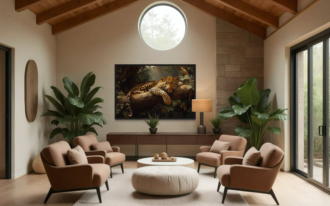 a living room filled with furniture and a painting on the wall