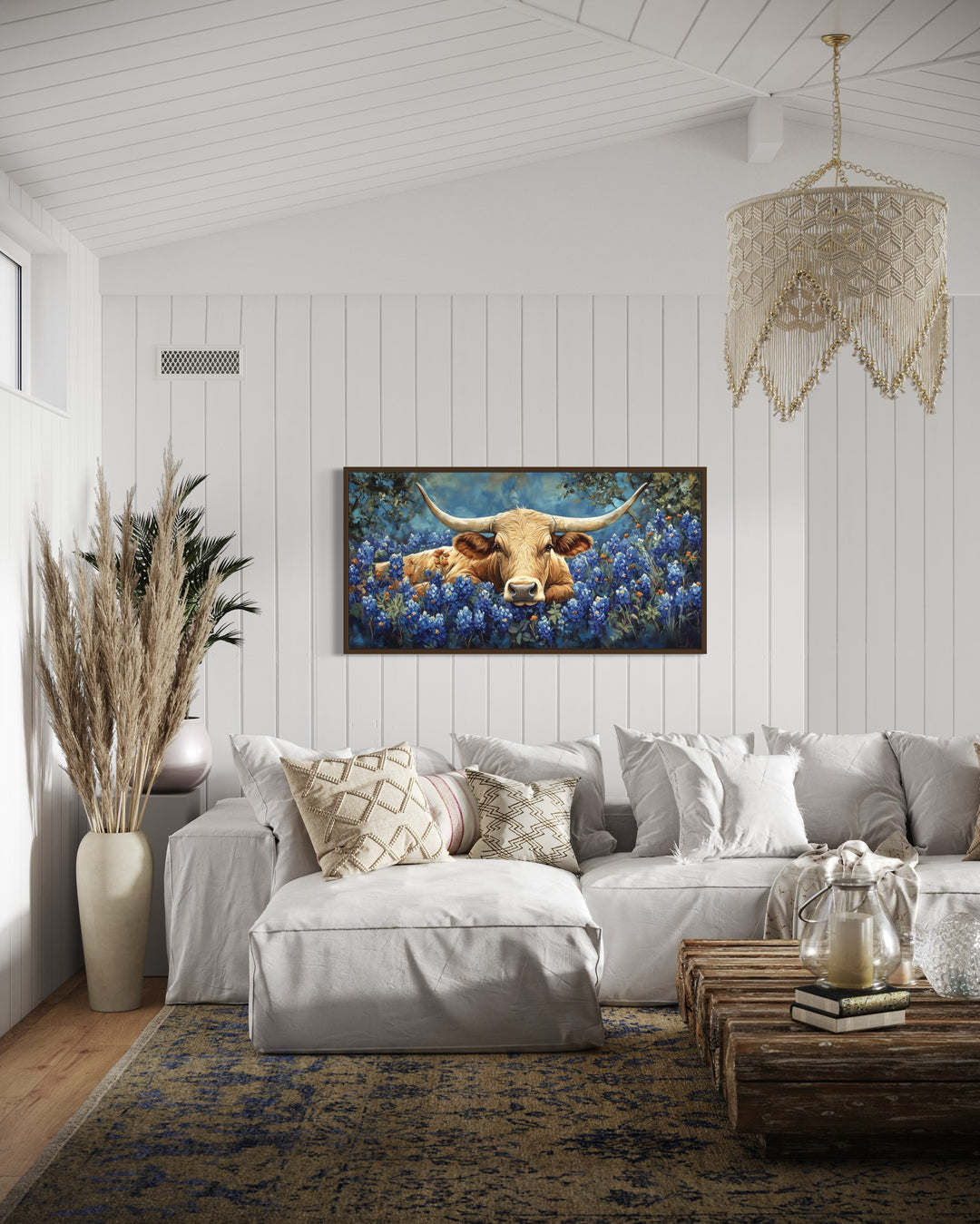 Longhorn in Bluebonnets Rustic Farmhouse Canvas Wall Art in a living room filled with furniture