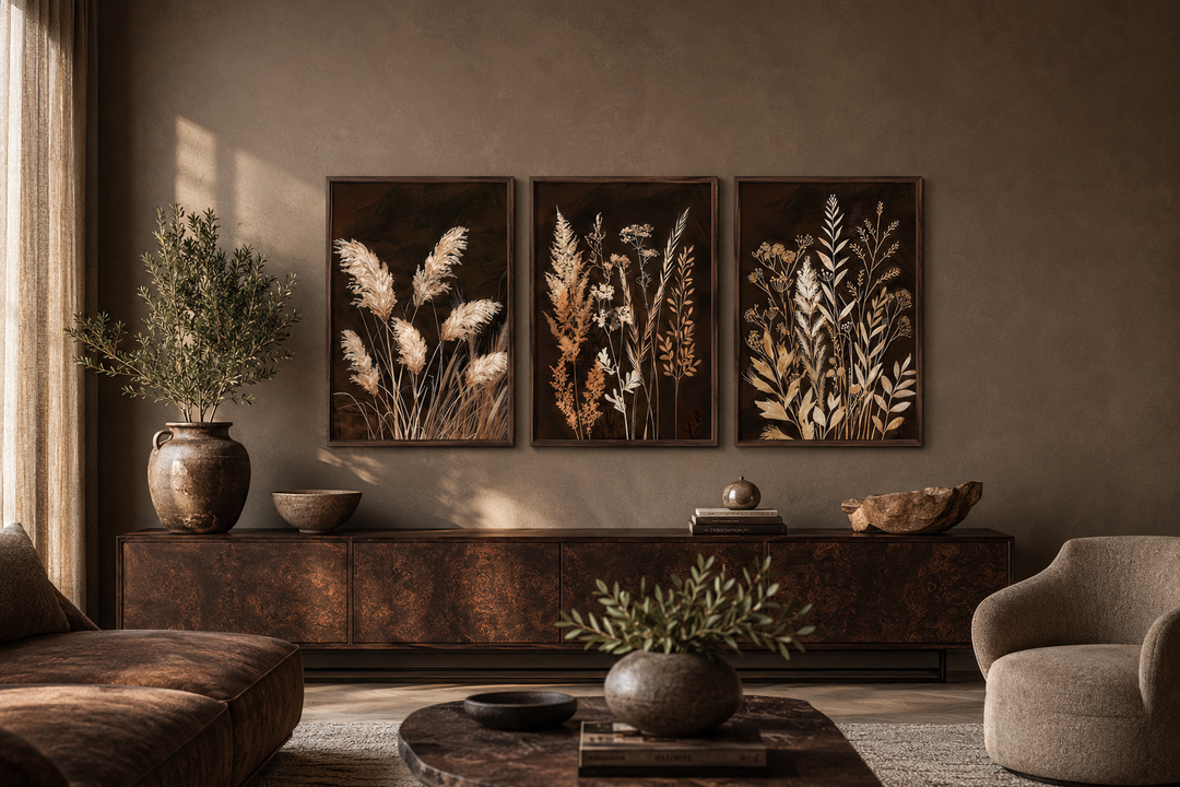 Set of 3 brown and beige boho botanical grass canvas wall art prints in a living room setting.