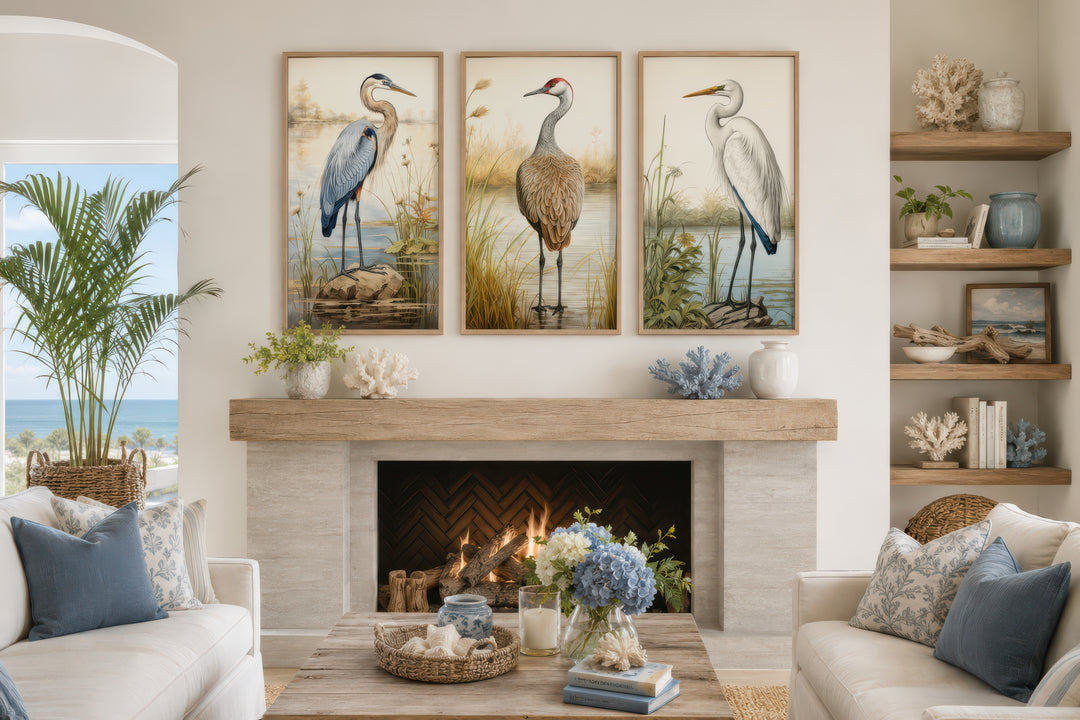 Set of 3 framed canvas prints featuring a Blue Heron, Sandhill Crane, and Great Egret over a mantel.