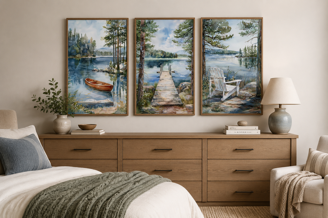 Three-piece watercolor lake house wall art featuring a boat, fishing dock, and Adirondack chair.